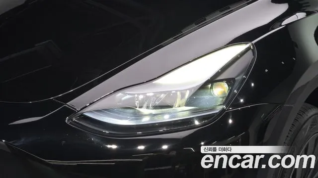 Tesla Model Y — Фото автомобиля 22