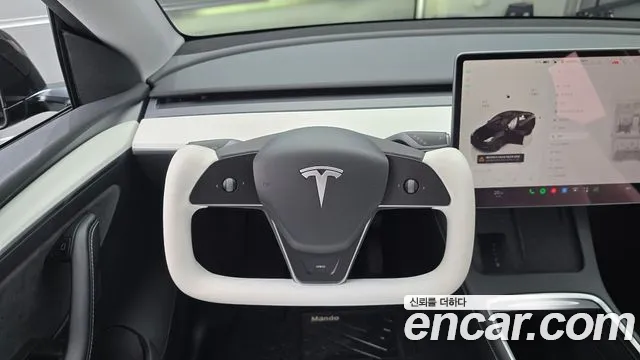Tesla Model Y — Фото автомобиля 19
