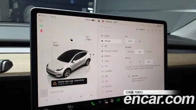 Tesla Model Y — Фото автомобиля 17