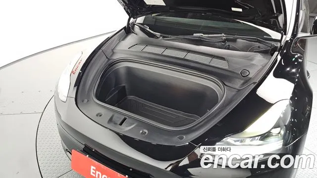 Tesla Model Y — Фото автомобиля 9
