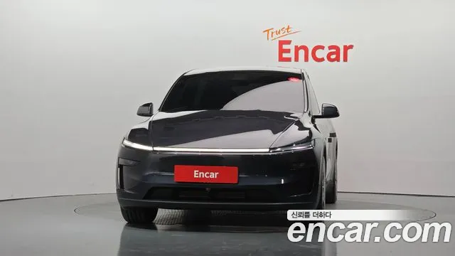 Tesla Model Y — Фото автомобиля 3