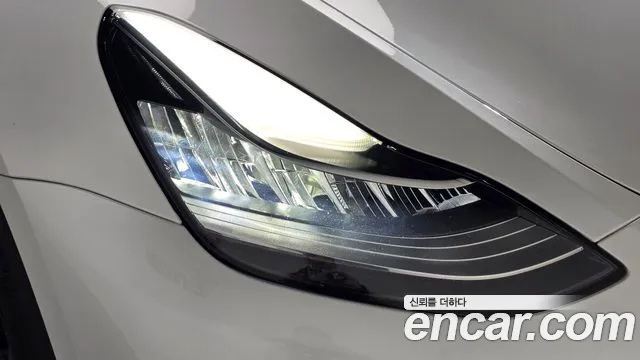 Tesla Model Y — Фото автомобиля 7