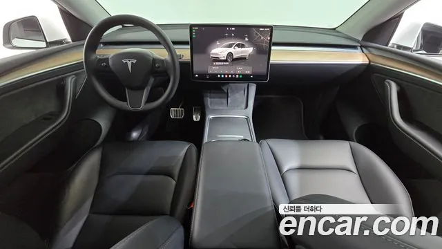 Tesla Model Y — Фото автомобиля 10