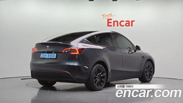 Tesla Model Y — Фото автомобиля 2