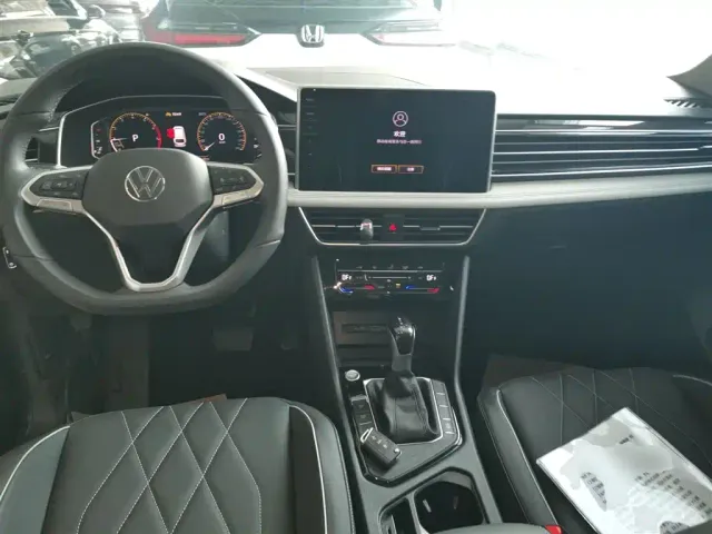 Volkswagen Tiguan L — Фото автомобиля 5
