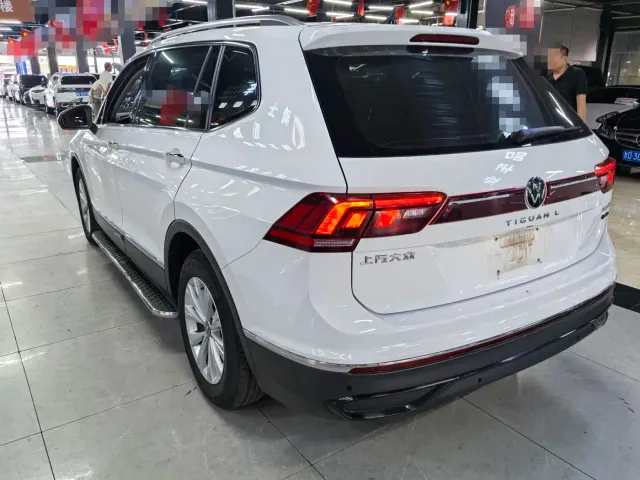 Volkswagen Tiguan L — Фото автомобиля 4