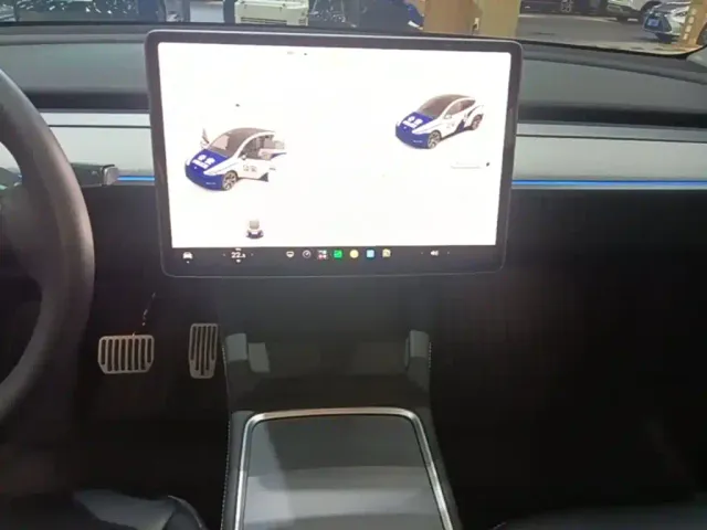 Tesla Model Y — Фото автомобиля 12