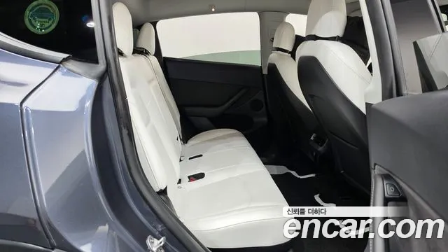 Tesla Model Y — Фото автомобиля 17