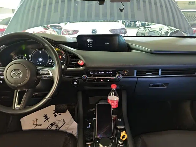 Mazda Axela — Фото автомобиля 12