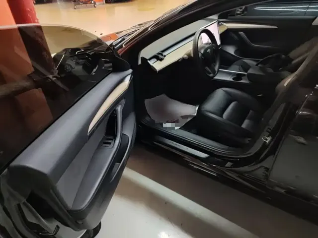 Tesla Model 3 — Фото автомобиля 15