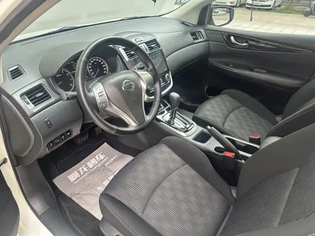 Nissan Tiida — Фото автомобиля 8