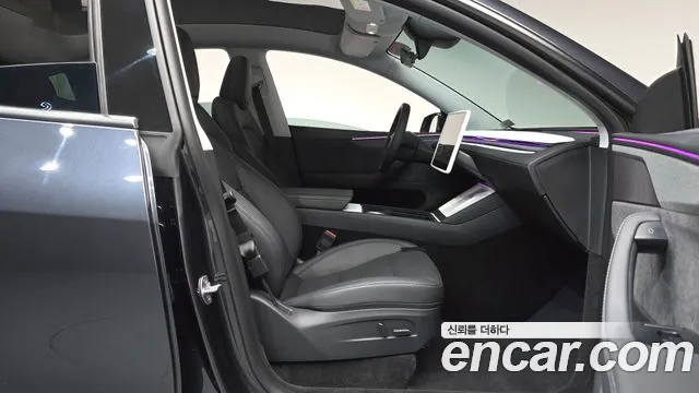 Tesla Model Y — Фото автомобиля 11