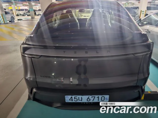 Tesla Model Y — Фото автомобиля 7