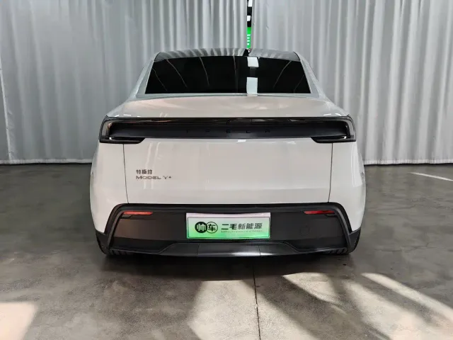Tesla Model Y — Фото автомобиля 5