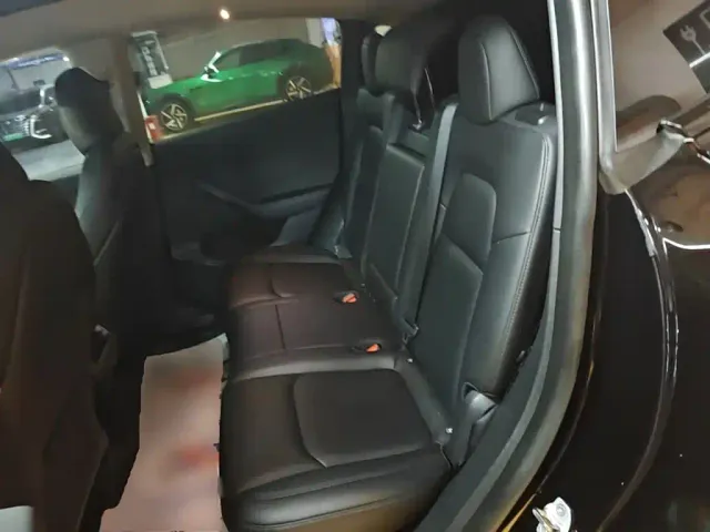 Tesla Model Y — Фото автомобиля 16