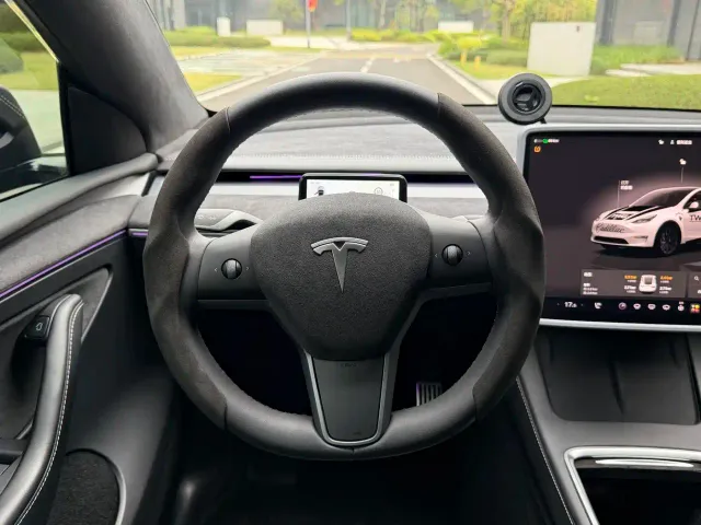 Tesla Model Y — Фото автомобиля 10