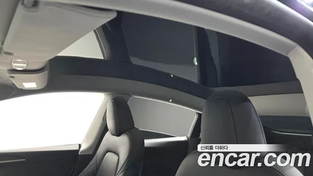 Tesla Model Y — Фото автомобиля 22