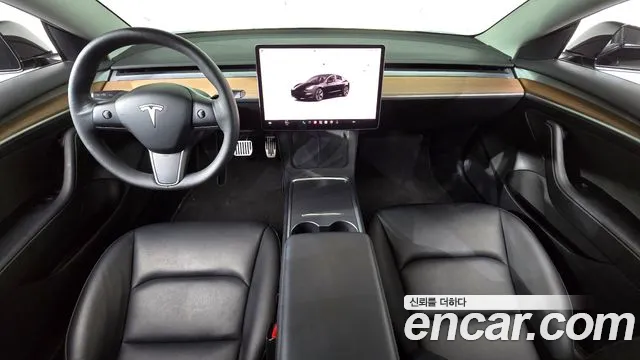 Tesla Model 3 — Фото автомобиля 7