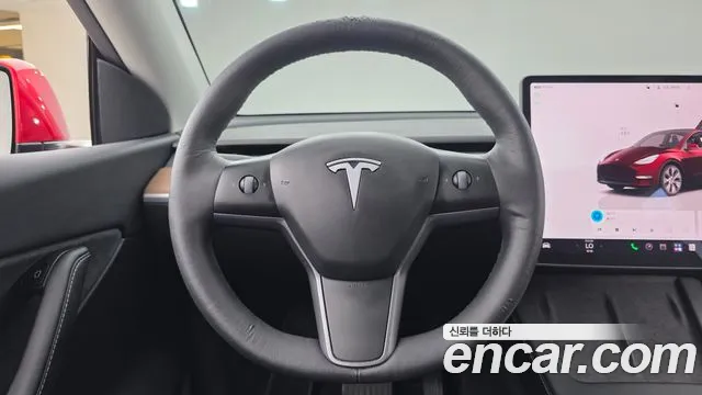 Tesla Model Y — Фото автомобиля 13