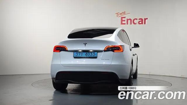 Tesla Model Y — Фото автомобиля 4