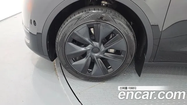 Tesla Model Y — Фото автомобиля 4