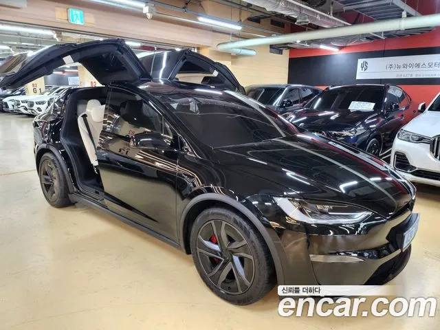 Tesla Model X — Фото автомобиля 20