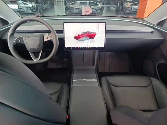 Tesla Model 3 — Фото автомобиля 9