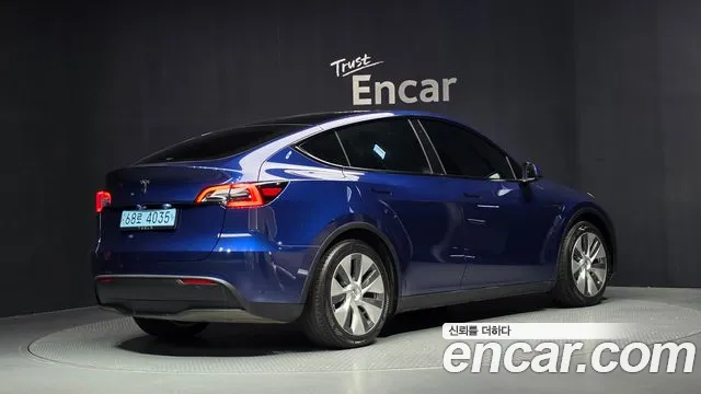 Tesla Model Y — Фото автомобиля 2