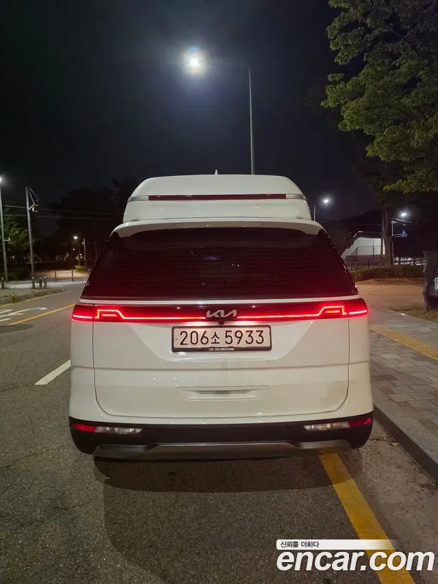 Kia Carnival Generation 4 — Фото автомобиля 4