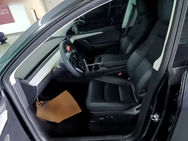 Tesla Model Y — Фото автомобиля 14