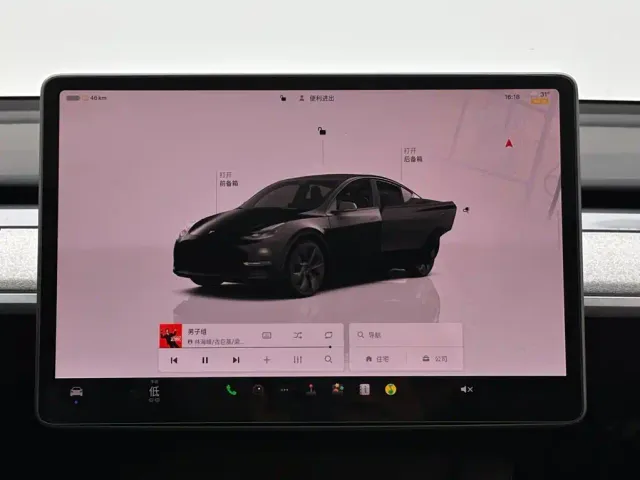 Tesla Model Y — Фото автомобиля 13