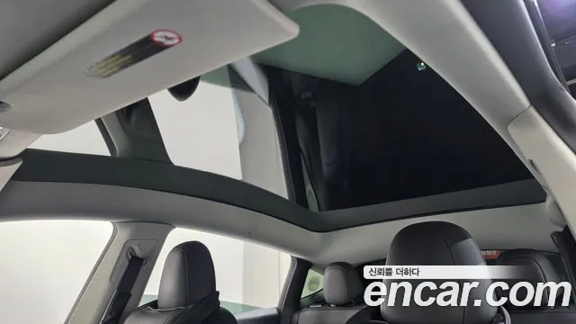 Tesla Model Y — Фото автомобиля 23