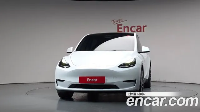 Tesla Model Y — Фото автомобиля 3