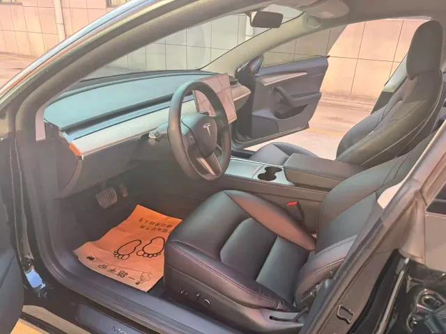 Tesla Model 3 — Фото автомобиля 7
