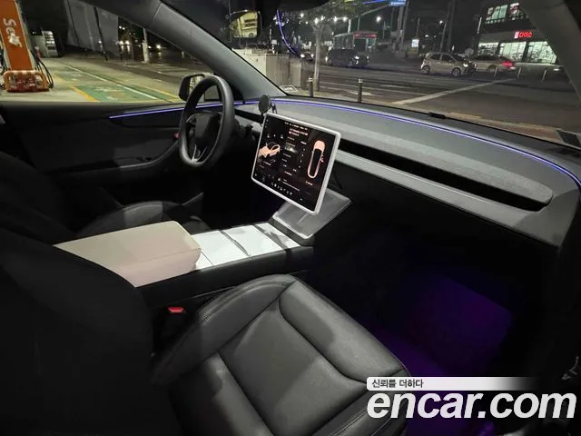 Tesla Model Y — Фото автомобиля 18