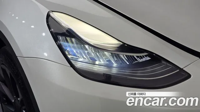 Tesla Model Y — Фото автомобиля 19