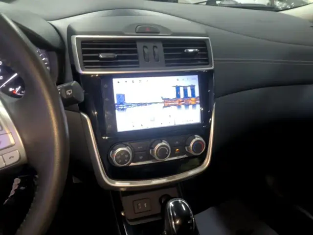 Nissan Tiida — Фото автомобиля 12