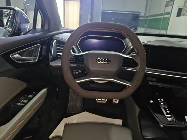 Audi Q4 e-tron — Фото автомобиля 10