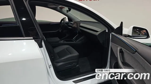 Tesla Model Y — Фото автомобиля 10