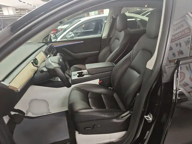 Tesla Model Y — Фото автомобиля 14