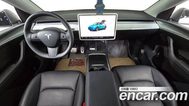 Tesla Model Y — Фото автомобиля 3