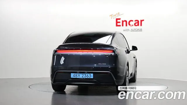 Tesla Model Y — Фото автомобиля 4