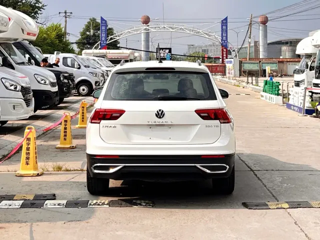Volkswagen Tiguan L — Фото автомобиля 4