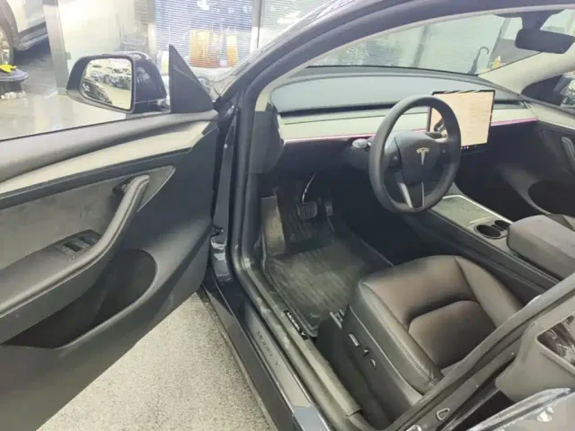 Tesla Model Y — Фото автомобиля 15