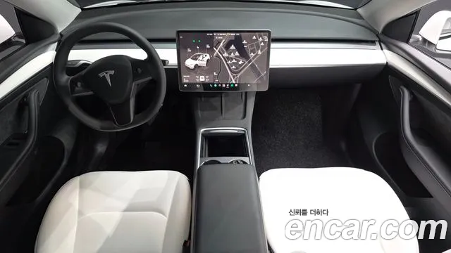 Tesla Model Y — Фото автомобиля 4