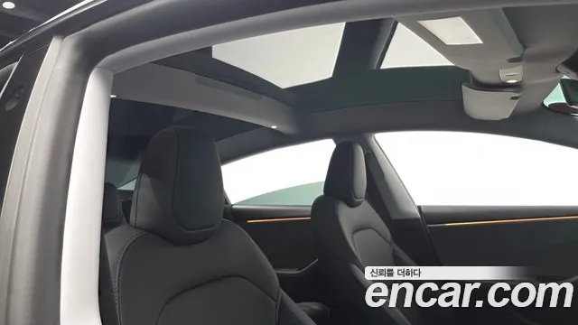 Tesla Model 3 — Фото автомобиля 18
