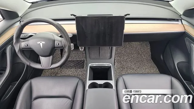 Tesla Model 3 — Фото автомобиля 7