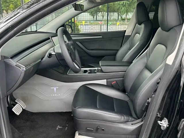 Tesla Model Y — Фото автомобиля 10