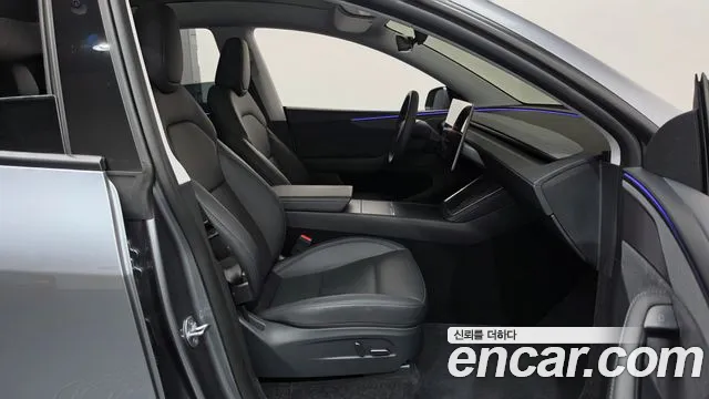 Tesla Model Y — Фото автомобиля 16
