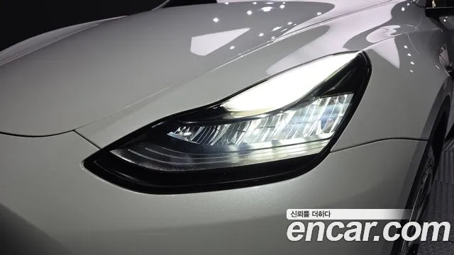 Tesla Model Y — Фото автомобиля 7